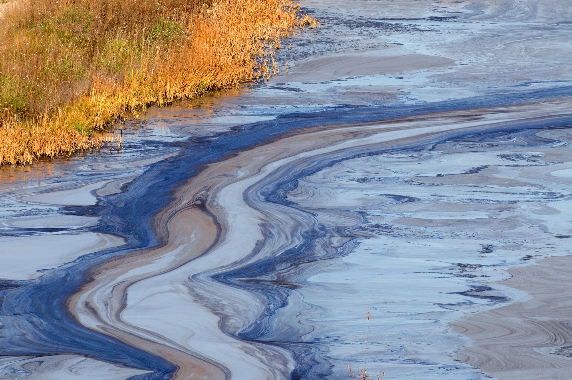 oil spill into a western river